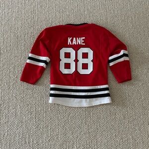 Red Hockey Jersey with Number 88